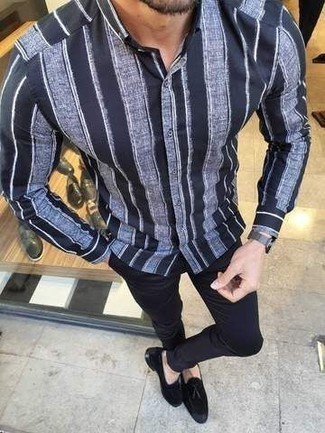 Navy and White Vertical Striped Long Sleeve Shirt Outfits For Men: If you're looking for a casual but also dapper getup, team a navy and white vertical striped long sleeve shirt with navy chinos. Bring an elegant twist to your ensemble by slipping into black suede tassel loafers.