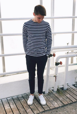 Navy Long Sleeve T-Shirt Outfits For Men: This casual combination of a navy long sleeve t-shirt and navy chinos is a never-failing option when you need to look nice in a flash. We adore how a pair of white leather low top sneakers makes this outfit complete.
