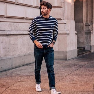 Navy Long Sleeve T-Shirt Outfits For Men: A navy long sleeve t-shirt and navy jeans are a perfect combination to be utilised on weekend days. Finishing off with white canvas high top sneakers is the simplest way to infuse a touch of stylish nonchalance into this outfit.