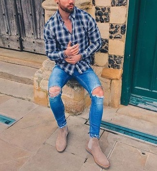 Blue Plaid Long Sleeve Shirt Outfits For Men: Pairing a blue plaid long sleeve shirt and blue ripped skinny jeans will be definitive proof of your expertise in men's fashion even on weekend days. Take a classic approach with footwear and complete your look with beige suede chelsea boots.