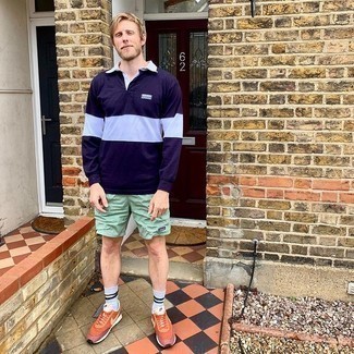 Mint Sports Shorts Outfits For Men: We say a big yes to this casual combo of a navy and white polo neck sweater and mint sports shorts! And if you want to instantly dial down this ensemble with shoes, why not introduce a pair of orange athletic shoes to the equation?