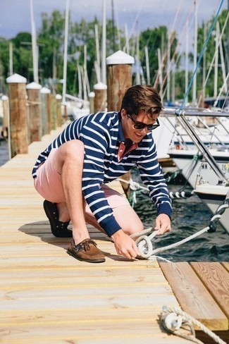 Hot Pink Shorts Outfits For Men: Consider teaming a navy and white horizontal striped polo neck sweater with hot pink shorts for relaxed elegance with a rugged spin. Brown suede boat shoes are guaranteed to bring a sense of stylish casualness to this ensemble.