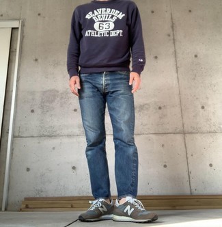 Navy and White Print Sweatshirt Outfits For Men: If you're facing a fashion situation where comfort is crucial, this pairing of a navy and white print sweatshirt and navy jeans is a no-brainer. Why not take a more casual approach with shoes and complement your ensemble with dark brown athletic shoes?