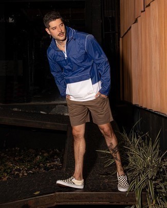 Beige Check Canvas Slip-on Sneakers Outfits For Men: A navy and white windbreaker and brown shorts are an easy way to inject effortless cool into your daily repertoire. Let your styling prowess truly shine by complementing this ensemble with a pair of beige check canvas slip-on sneakers.