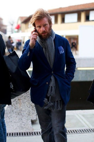 Team a navy blazer with charcoal wool dress pants if you're going for a proper, smart getup.