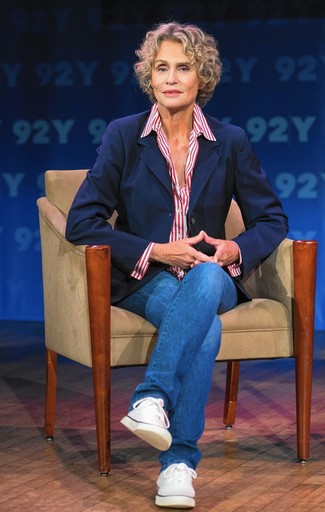 Lauren Hutton wearing Navy Blazer, White and Red Vertical Striped Dress Shirt, Blue Jeans, White Canvas Low Top Sneakers