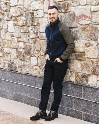 Black Jeans Outfits For Men: Such staples as a navy bomber jacket and black jeans are an easy way to introduce some cool into your off-duty collection. A pair of dark brown suede desert boots will pull the whole thing together.