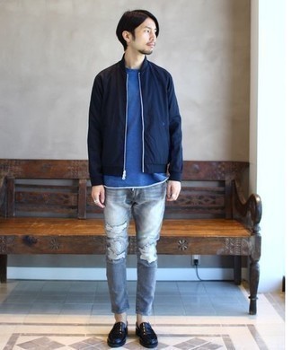 Grey Ripped Skinny Jeans Outfits For Men: Busy off-duty days call for a pared down yet casually dapper getup, such as a navy bomber jacket and grey ripped skinny jeans. A trendy pair of black leather loafers is an effective way to power up your ensemble.