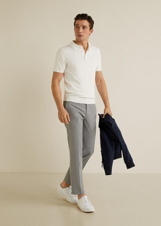 Grey Chinos Outfits: A navy bomber jacket and grey chinos work together beautifully. Round off your outfit with a pair of white canvas low top sneakers to jazz things up.