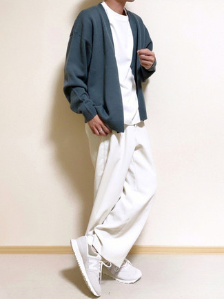 White and Navy Athletic Shoes Outfits For Men: A navy cardigan and white chinos are wonderful menswear staples that will integrate nicely within your current routine. For something more on the daring side to finish off your outfit, introduce white and navy athletic shoes to this ensemble.