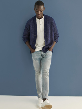 Navy Cardigan Outfits For Men: Fashionable and practical, this casual pairing of a navy cardigan and light blue jeans provides ample styling opportunities. Finishing with a pair of white leather low top sneakers is a guaranteed way to infuse an air of stylish nonchalance into your look.