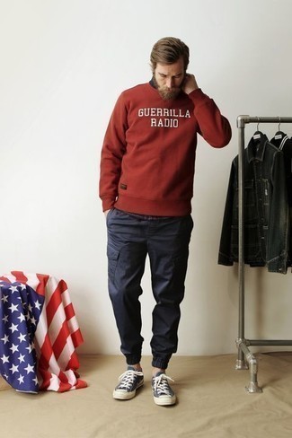 Men's Navy and White Canvas Low Top Sneakers, Navy Cargo Pants, Navy Check Short Sleeve Shirt, Red Print Sweatshirt