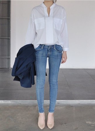 White Long Sleeve Blouse Outfits: If you're seeking to take your casual style game to a new height, go for a white long sleeve blouse and blue skinny jeans. Consider beige leather pumps as the glue that brings your look together.
