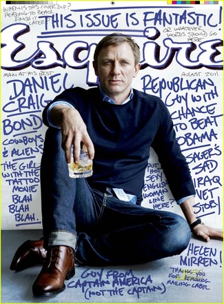 Daniel Craig wearing Navy Crew-neck Sweater, Blue Dress Shirt, Navy Jeans, Brown Leather Derby Shoes