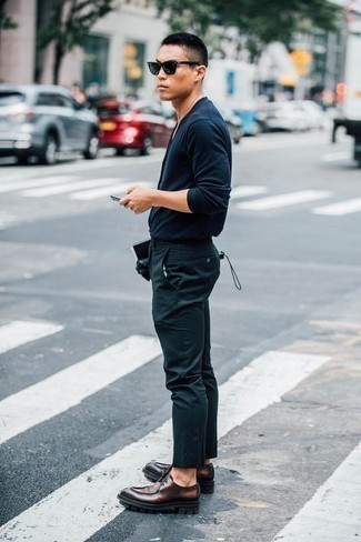 Brown Chunky Leather Derby Shoes Outfits: Teaming a navy crew-neck sweater with navy chinos is a good choice for a casually cool ensemble. Change up this look with a more polished kind of shoes, like these brown chunky leather derby shoes.