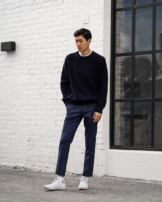 Navy Crew-neck Sweater Outfits For Men: For a laid-back outfit, pair a navy crew-neck sweater with navy chinos — these two items fit beautifully together. Go off the beaten track and jazz up your outfit with white canvas high top sneakers.