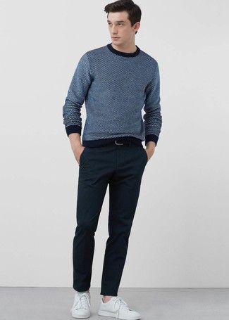 Navy Crew-neck Sweater Warm Weather Outfits For Men: Try teaming a navy crew-neck sweater with navy chinos for a daily outfit that's full of style and personality. For a more laid-back take, why not complement this ensemble with white leather low top sneakers?