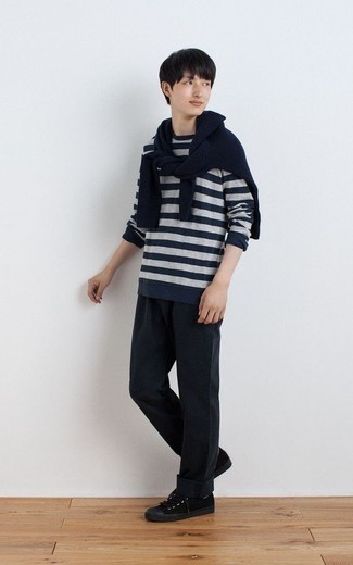 Navy Horizontal Striped Long Sleeve T-Shirt Outfits For Men: A navy horizontal striped long sleeve t-shirt and navy chinos are a good combo to carry you throughout the day. If in doubt about the footwear, complement your ensemble with black canvas low top sneakers.