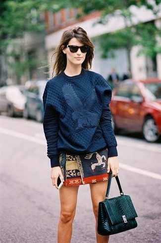 Navy Mini Skirt Outfits: A navy quilted crew-neck sweater and a navy mini skirt are the perfect foundation for an absolutely stylish casual outfit.
