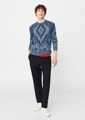 Navy Print Crew-neck Sweater Outfits For Men: Reach for a navy print crew-neck sweater and black chinos for comfort dressing with a modern spin. If not sure about what to wear when it comes to shoes, go with white canvas low top sneakers.