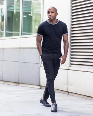 Black Low Top Sneakers Outfits For Men: You're looking at the solid proof that a navy crew-neck t-shirt and black chinos look awesome when worn together in an off-duty outfit. Look at how nice this look pairs with black low top sneakers.