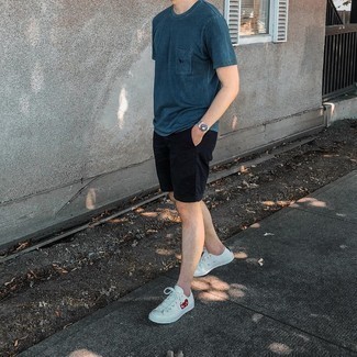Charcoal Canvas Watch Outfits For Men: For something more on the cool and laid-back end, you can rock a navy crew-neck t-shirt and a charcoal canvas watch. To add elegance to your getup, finish off with a pair of white print canvas low top sneakers.