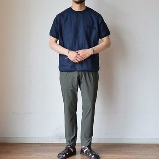 Dark Green Chinos Outfits: For effortless style without the need to sacrifice on comfort, we like this combination of a navy crew-neck t-shirt and dark green chinos. To give this ensemble a more laid-back twist, why not throw in a pair of dark brown leather sandals?