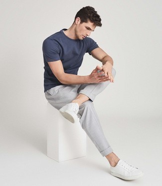 Blue Crew-neck T-shirt Outfits For Men: Go for a straightforward but casually stylish option by teaming a blue crew-neck t-shirt and grey chinos. Add a pair of white leather low top sneakers to the mix for extra fashion points.