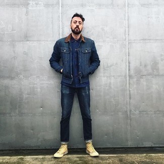 Beige Canvas High Top Sneakers Outfits For Men: Marry a navy denim jacket with navy jeans for a casual outfit with a modern twist. If you need to immediately tone down this outfit with shoes, complement your outfit with beige canvas high top sneakers.