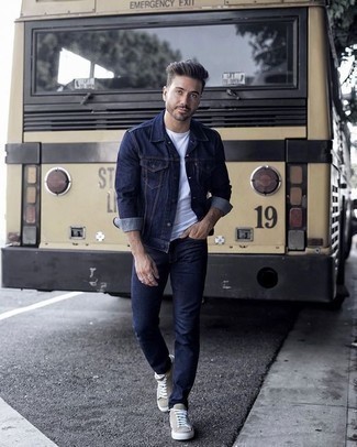 White and Black Crew-neck T-shirt with Denim Jacket Outfits For Men: To create a laid-back look with a modern take, you can wear a denim jacket and a white and black crew-neck t-shirt. When in doubt about what to wear on the shoe front, go with tan canvas low top sneakers.