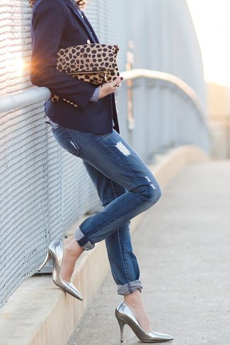 Navy Double Breasted Blazer Outfits For Women: One of the coolest ways to style a navy double breasted blazer is to marry it with blue boyfriend jeans for a laid-back ensemble. Silver leather pumps will add a sultry vibe to this outfit.