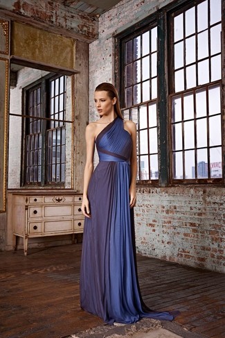Dress in a navy evening dress to look outrageously gorgeous.