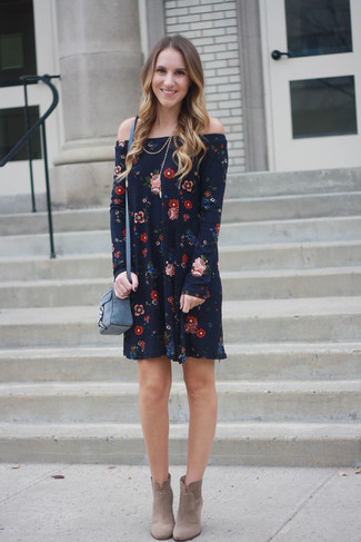 Choose a navy floral off shoulder dress for a killer and fashionable outfit. Serve a little outfit-mixing magic by slipping into a pair of beige suede ankle boots.