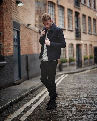 Black Canvas High Top Sneakers Outfits For Men: This casual combination of a navy wool harrington jacket and black skinny jeans is a real life saver when you need to look sharp but have no extra time. Finishing off with a pair of black canvas high top sneakers is a surefire way to add a touch of stylish casualness to this look.