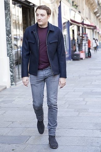 Violet Crew-neck T-shirt Outfits For Men: You're looking at the irrefutable proof that a violet crew-neck t-shirt and grey jeans look awesome when you pair them up in a casual outfit. Why not take a classic approach with shoes and introduce charcoal suede chelsea boots to the equation?