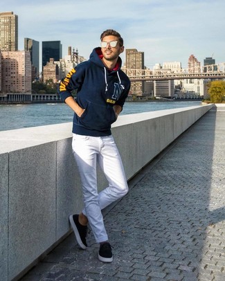 Navy Hoodie Outfits For Men: This combination of a navy hoodie and white jeans combines comfort and practicality and helps you keep it simple yet modern. Let your styling savvy really shine by rounding off this look with black suede low top sneakers.