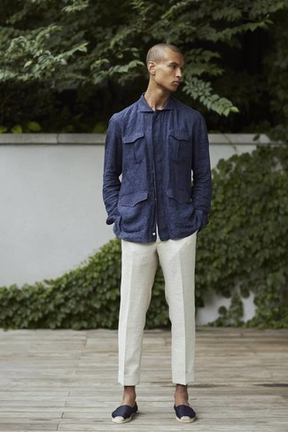 White Linen Chinos Outfits: Opt for a navy linen shirt jacket and white linen chinos to look sophisticated but not too formal. Want to tone it down on the shoe front? Add black canvas espadrilles to this ensemble for the day.