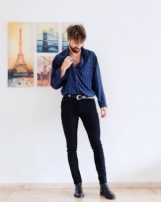 Navy Vertical Striped Long Sleeve Shirt Outfits For Men: Pair a navy vertical striped long sleeve shirt with black skinny jeans if you're searching for an outfit idea that conveys laid-back cool. Black leather chelsea boots are guaranteed to bring an added touch of refinement to your outfit.