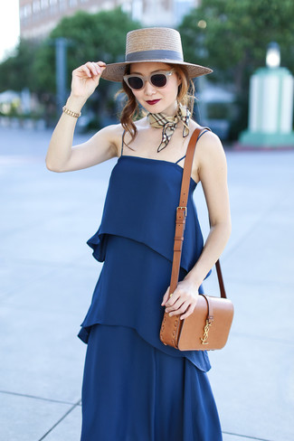 Tan Leather Crossbody Bag Outfits: Marrying a navy silk maxi dress with a tan leather crossbody bag is an on-point pick for a relaxed casual yet stylish outfit.