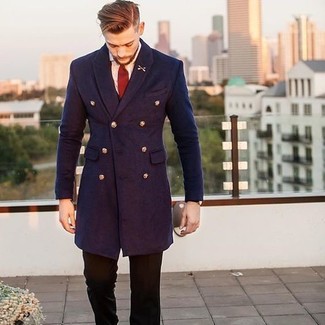 Red Tie Outfits For Men: Combining a navy overcoat and a red tie is a guaranteed way to infuse rugged sophistication into your styling routine.