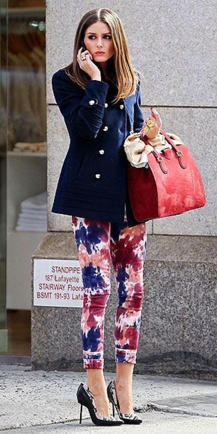 Olivia Palermo wearing Navy Pea Coat, Multi colored Tie-Dye Skinny Jeans,  Black and White Print Leather Pumps, Red Leather Tote Bag