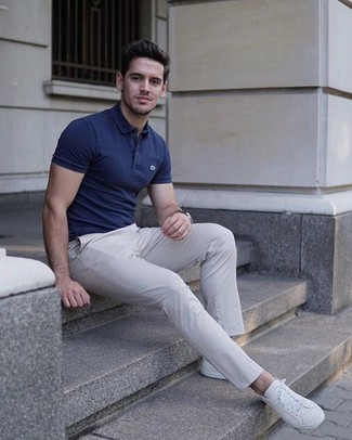 Blue Polo Outfits For Men: If you need to go about your day with confidence in your getup, wear a blue polo and beige chinos. Complement your outfit with white leather low top sneakers et voila, your getup is complete.