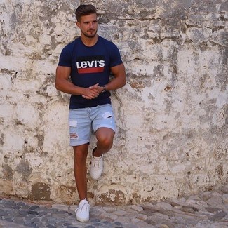 Tan Leather Low Top Sneakers Outfits For Men: For relaxed dressing with an edgy finish, try pairing a navy print crew-neck t-shirt with light blue ripped denim shorts. A great pair of tan leather low top sneakers is an effective way to punch up your getup.
