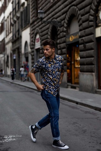Blue Print Short Sleeve Shirt Outfits For Men: Why not reach for a blue print short sleeve shirt and blue jeans? As well as totally practical, these items look good when worn together. Introduce a more casual feel to by sporting a pair of black and white canvas high top sneakers.