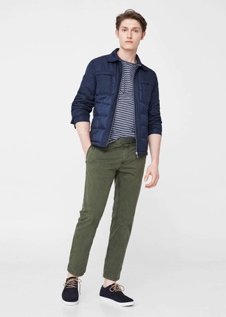 Navy Horizontal Striped Crew-neck T-shirt Outfits For Men: Extremely dapper, this laid-back pairing of a navy horizontal striped crew-neck t-shirt and olive chinos provides variety. For extra style points, complete your getup with a pair of black plimsolls.