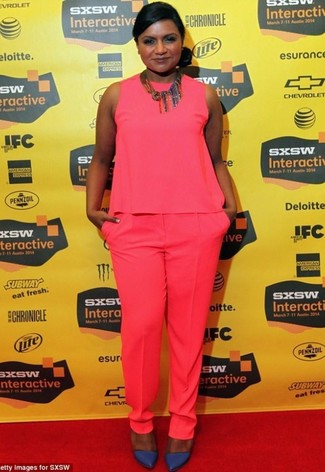Mindy Kaling wearing Multi colored Necklace, Navy Leather Pumps, Hot Pink Dress Pants, Hot Pink Sleeveless Top