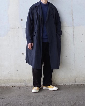 Navy Raincoat Outfits For Men: This casual pairing of a navy raincoat and black corduroy chinos is ideal when you need to feel confident in your look. Add mustard canvas low top sneakers to pull the whole thing together.