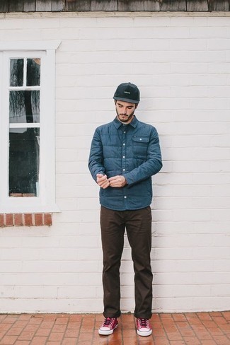 Navy Quilted Shirt Jacket Outfits For Men: We're loving how a navy quilted shirt jacket combines with dark brown chinos. Introduce a sense of stylish casualness to by rounding off with hot pink canvas low top sneakers.
