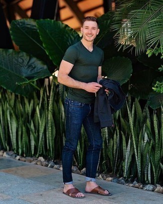 Brown Leather Sandals Outfits For Men: A navy shirt jacket and navy jeans combined together are a sartorial dream for those who appreciate relaxed casual styles. Rounding off with brown leather sandals is a simple way to bring a more casual touch to this getup.