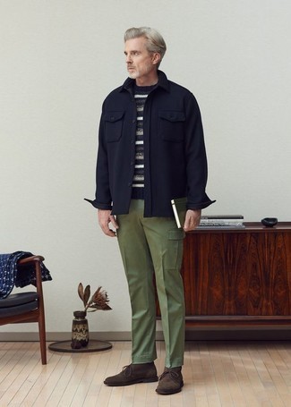 Olive Cargo Pants Smart Casual Outfits: For a casually stylish outfit, reach for a navy wool shirt jacket and olive cargo pants — these pieces work pretty good together. All you need is a pair of dark brown suede desert boots.